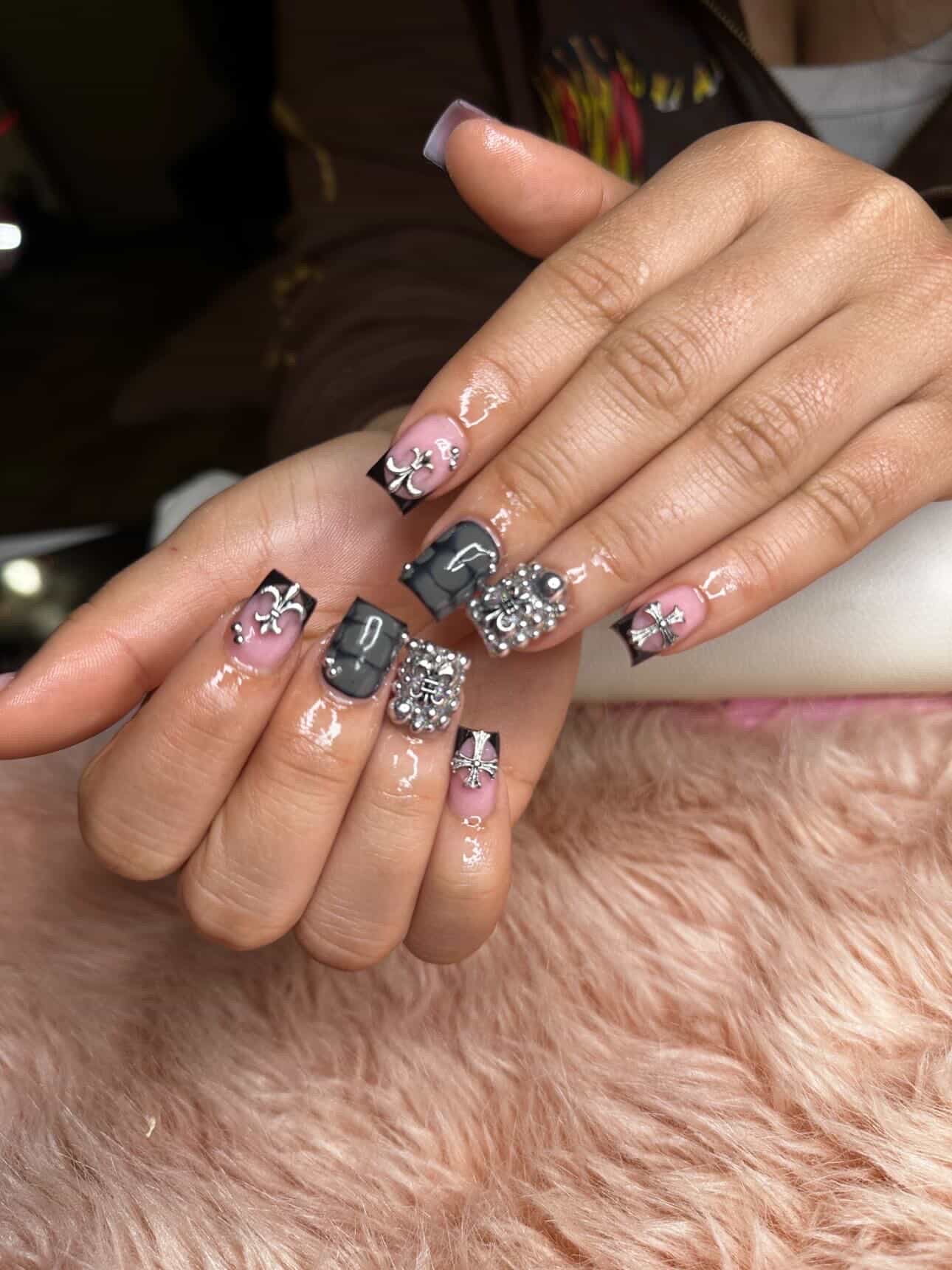 Gothic cross nail art with charms